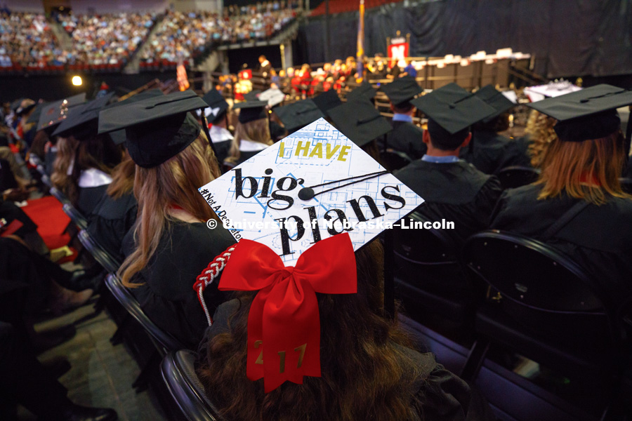 A college of architecture graduate's decorated mortarboard in a sea of graduates. Students received their undergraduate diplomas Saturday morning in Lincoln's Pinnacle Bank Arena. 2452 degrees were awarded Saturday morning. May 6, 2017. Photo by Craig