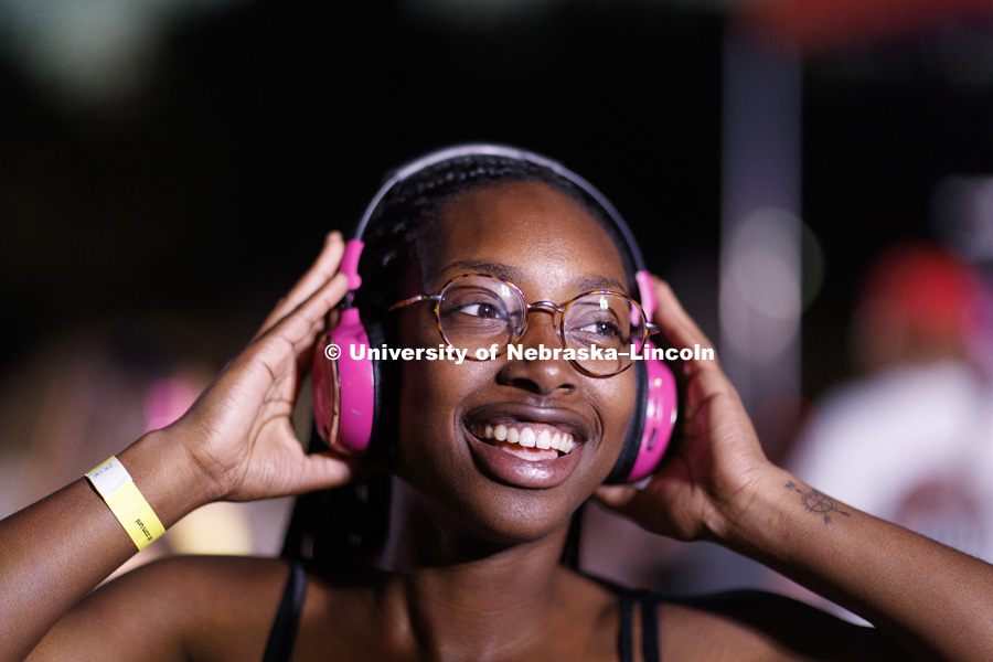 Kadina Koonce dances during the headphone disco party at the Back to School Bash on the Nebraska Union Plaza and Green Space sponsored by Campus NightLife. Students enjoyed a headphone disco party, inflatable games, and refreshments. August 25, 2017.