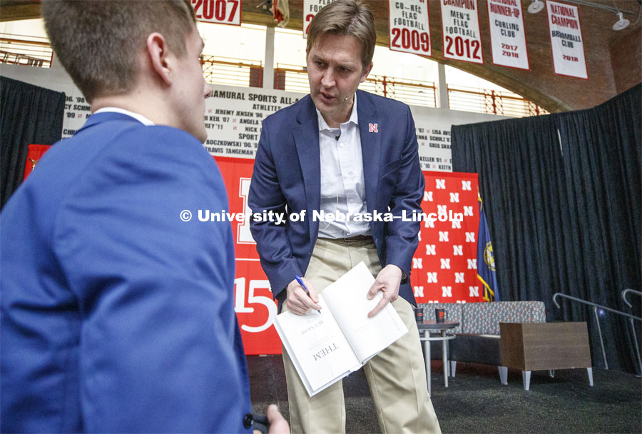 Senator Ben Sasse autographs a copy of his book for Garrett Streeks, a junior from Lincoln. The Charter Week event, “Why Don’t We Get Along? How Huskers Can Change the Future: A Student-led Conversation with Senator Ben Sasse”. February 11, 2019. Photo by Craig Chandler / University Communication.
