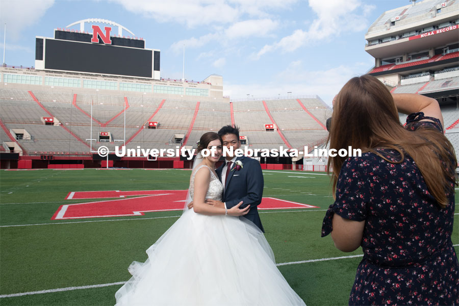 Homecoming week is a special time for Laura and Shayne Arriola. In 2017, the two were crowned homecoming king and queen, and Shayne proposed in front of 90,000 Husker fans. Two weeks ago, Laura and Shayne were married and celebrated their wedding with photos (taken by Brooke LaBenz Graham) at Memorial Stadium. September 21, 2019. Photo by Gregory Nathan / University Communication.