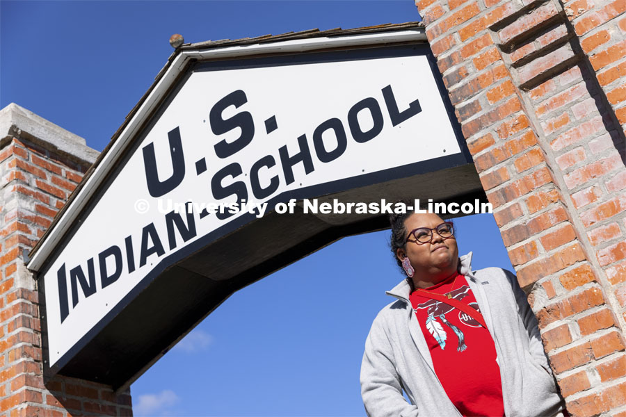 Nasia Olson-Whitefeather looks over the former rodeo grounds that was part of the school. Students from UNITE tour the Genoa Indian School in Genoa, Nebraska. October 10, 2021. Photo by Craig Chandler / University Communication.