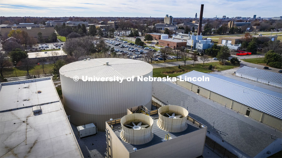 Thermal Energy storage tank on East Campus with the East Campus Power Plant (smokestack) in the background. UNL Utility Plants. November 29, 2021. Photo by Craig Chandler / University Communication.