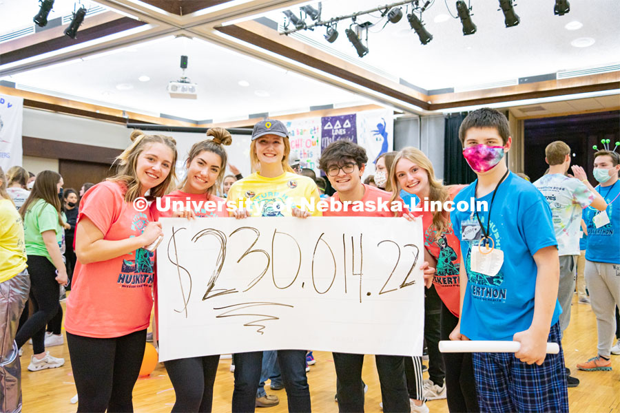 Students reveal the total raised during the 2022 HuskerThon. University of Nebraska–Lincoln students exceeded their goal, raising over $230,000 during the annual HuskerThon on Feb. 26. Also known as Dance Marathon, the event is part of a nationwide fundraiser supporting Children’s Miracle Network Hospitals. The annual event, which launched in 2006, is the largest student philanthropic event on campus. The mission of the event encourages participants to, “dance for those who can’t.” All funds collected by the Huskers benefit the Children’s Hospital and Medical Center in Omaha. February 26, 2022. Photo by Jonah Tran / University Communication.
