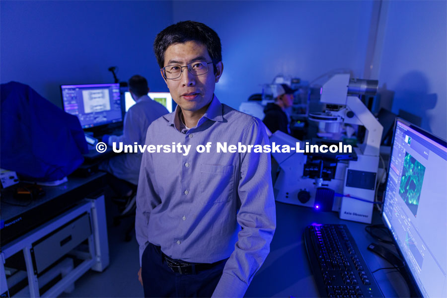 Ruiguo Yang, Assistant Professor of Mechanical and Materials Engineering, is using a $540,000 grant from the National Science Foundation’s Faculty Early Career Development Program to explore how cell-cell bridges respond to strains of different magnitudes and rates. He is photographed in the Translational Mechanobiology Lab. March 29, 2022. Photo by Craig Chandler / University Communication.