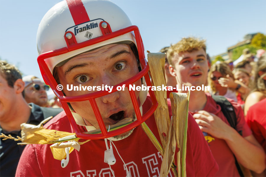 Denis McGinty, a sophomore from Chicago, suited up with a helmet and cornstalk for the game. Student Tailgate and Unity Walk in the Union green space before the game. NU vs. North Dakota. September 3, 2022. Photo by Craig Chandler / University Communication.