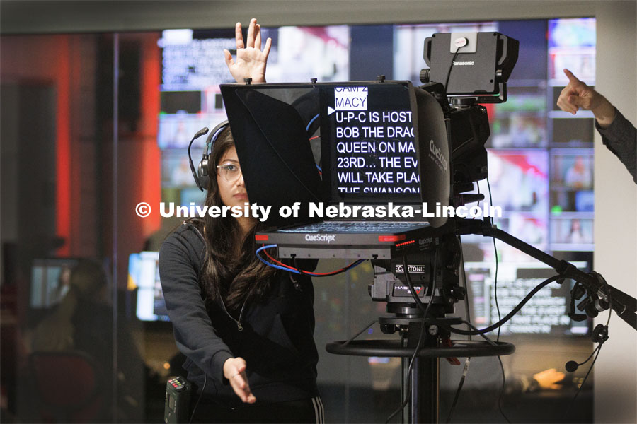 Emily Ortiz-Cantu counts down the seconds until the live shot begins for the anchors. Students produce their Nebraska Nightly telecast in the new Don and Lorena Meier Studio. April 28, 2023. Photo by Craig Chandler / University Communication.