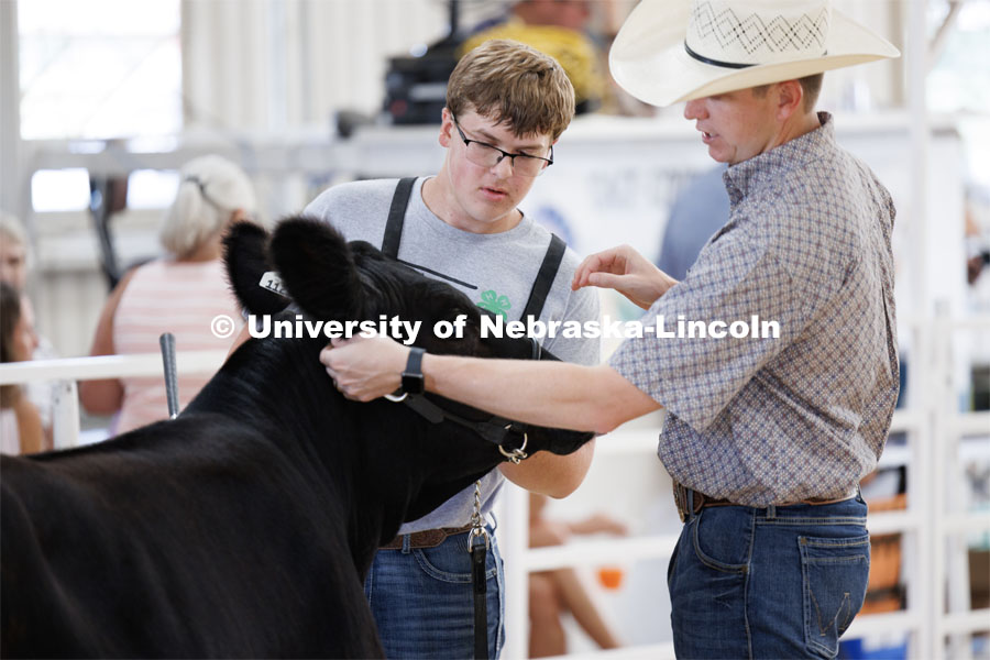 Braeden Humphreys of Wymore listens to showmanship tips from the judge during the senior division beef showmanship competition. 4H/FFA Beef Show at the Gage County Fair and Expo in Beatrice. July 28, 2023. Photo by Craig Chandler / University Communication.