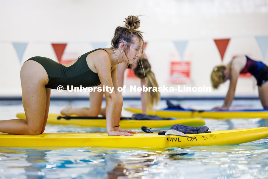 Paddleboard Yoga in the rec center pool as part of National Women's Health and Fitness Day. September 27, 2023. Photo by Craig Chandler / University Communication.