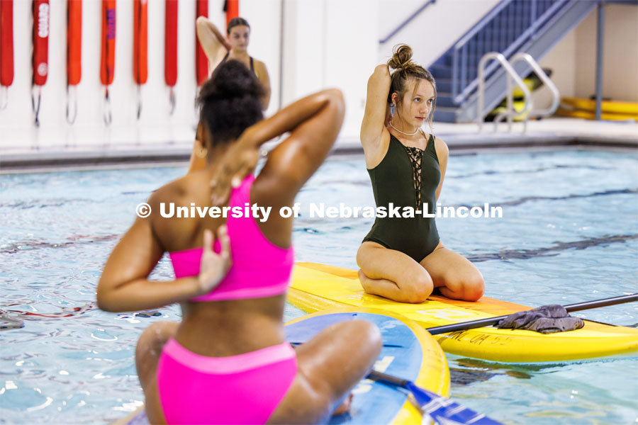 Paddleboard Yoga in the rec center pool as part of National Women's Health and Fitness Day. September 27, 2023. Photo by Craig Chandler / University Communication.