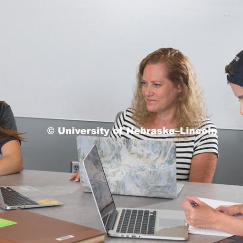 Huskers help create George Eliot digital archive. (From left) Rachel Gordon, Beverley Rilett and Megan Ekstrom discuss the George Eliot Archive during a meeting June 15, 2018, in the Adele Hall Learning Commons at Love Library. Not picture is team member
