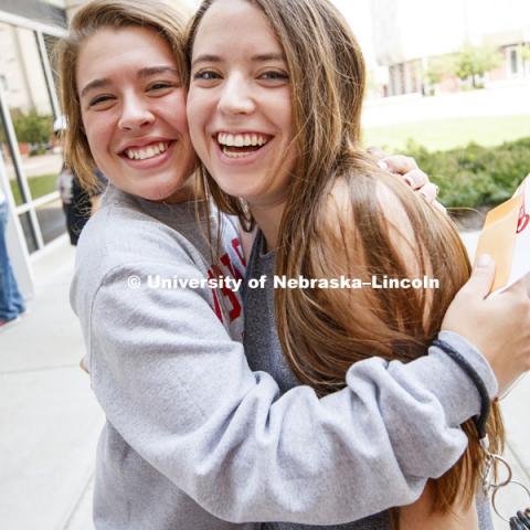 Kate Schroder of Crete gives her roommate, Hannah Cass of Lincoln, a hug after they met up at move in. Housing move in for sorority rush week. August 12, 2018. Photo by Craig Chandler / University Communication.