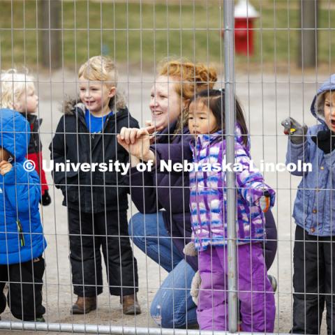 Madeline Williams and the children watch the construction machines working on the Legacy Plaza Meadow. Students in the Ruth Staples Child Development Lab go on a field trip to the Nebraska East Union and a walk around campus. March 1, 2024. Photo by Craig Chandler / University Communication and Marketing.