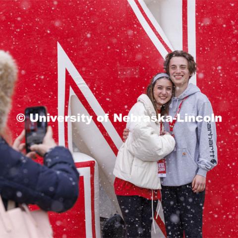 Erin Dodds and Jimmy Reay pose for a photo in front of the inflatable N outside the Nebraska Union. Admitted Student Day is UNL’s in-person, on-campus event for all admitted students. March 23, 2024. Photo by Craig Chandler / University Communication and Marketing.
