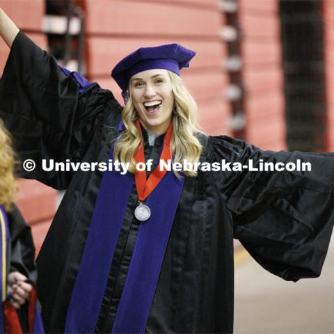 Lauren Kubat poses for the camera. College of Law commencement in Devaney on the volleyball court. May 3, 2024. Photo by Craig Chandler / University Communication and Marketing.