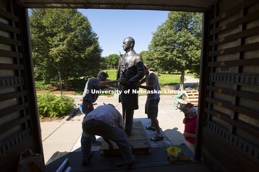 The statue of J. Sterling Morton gets its first view of East Campus on Monday morning. Statues of the four US State Senators that were appointed Secretary of Agriculture who were from Nebraska; J. Sterling Morton, Clifford Hardin,  Clayton Yeutter, and Mike Johanns are being erected on East Campus this week.  They will be dedicated in a ceremony Saturday, September 20, 2014. Photo by Craig Chandler / University Communications