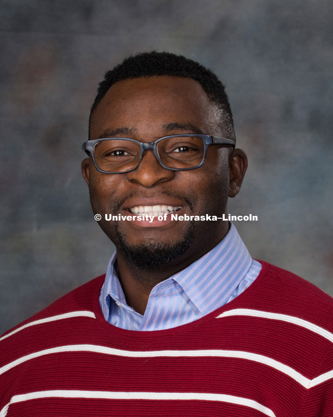 Studio portrait of John Osiri, New Faculty Photo Shoot, August 19, 2015. Photo by Greg Nathan, University Communications Photographer.