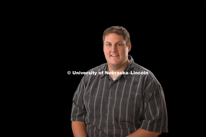 Studio portrait of Mark Nealeigh, Glenn Korff School of Music, Scheduling Facilities and Inventory Associate, August 8, 2015. Photo by Greg Nathan, University Communications Photographer.