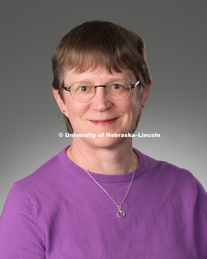 Studio portrait of Andrea Dinkelman, Library faculty/staff photo for web. May 4, 2016. Photo by Greg Nathan, University Communications Photographer.