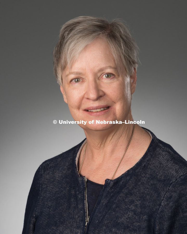 Studio portrait of Jeanetta Drueke, Library faculty/staff photo for web. May 4, 2016. Photo by Greg Nathan, University Communications Photographer.
