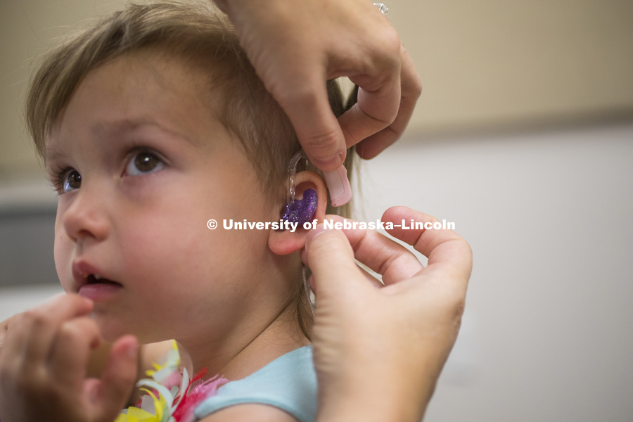 Evelyn Rausch, 2, is a patient of Barkley Center Audiologist Stacie Ray.  Evie was in for a hearing checks. June 13, 2016. Photo by Craig Chandler / University Communications