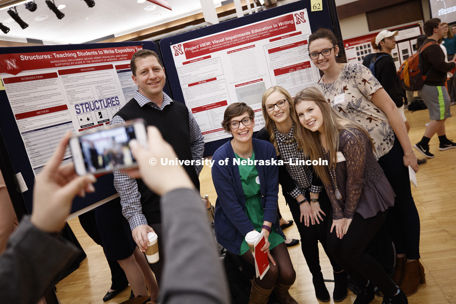 Michael Hebert's research students pose for a team photo at the beginning of the Research Fair. The first day of the Spring Research Fair features undergraduate student research. April 4, 2017. Photo by Craig Chandler / University Communication.