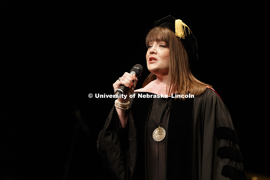 Jamie Reimer, assistant professor of voice, sings the National Anthem. Installation Ceremony for Chancellor Ronnie Green. April 6, 2017. Photo by Craig Chandler / University Communication.