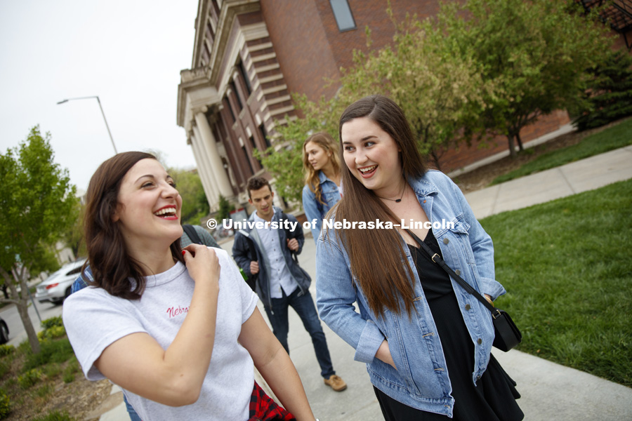 Students crossing campus by the Temple building. College of Business photo shoot. April 24, 2017. Photo by Craig Chandler / University Communication.