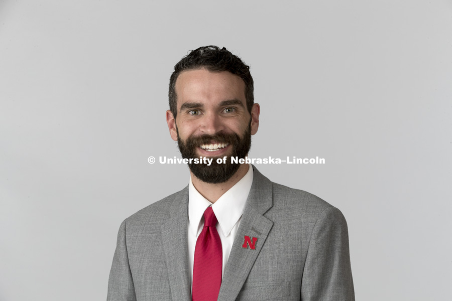 Studio portrait of Logan Spackman, Admissions Counselor for Office of Admissions. July 11, 2017. Photo by Craig Chandler / University Communication.