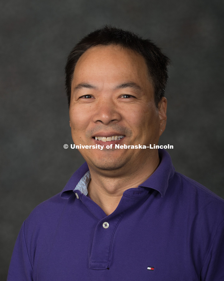 Studio portrait of Yongjun Wan, Research Associate Professor, Nutrition and Health Sciences, College of Education and Human Sciences. New Faculty Orientation. August 16, 2017. Photo by Greg Nathan, University Communication Photography.