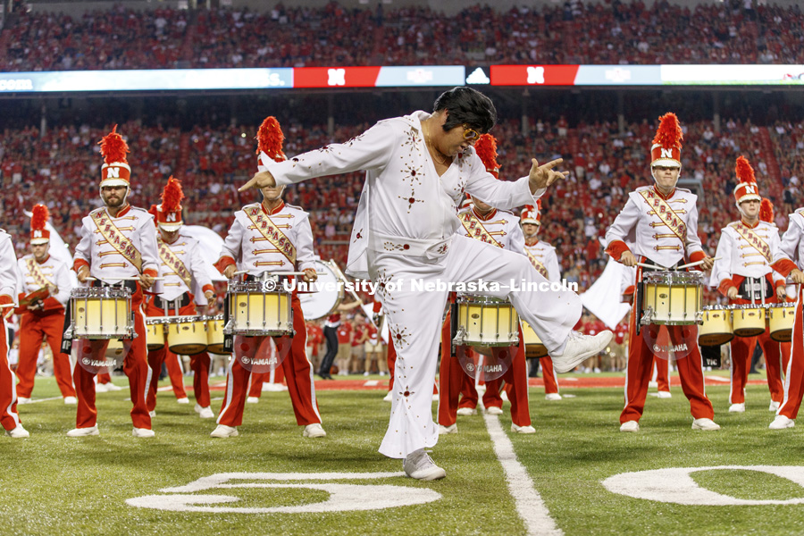 The Cornhusker Marching Band's halftime show featured the music of Elvis to commemorate the 40th anniversary of his death.  Husker alumni Bob Henrichs played the role during the show. Nebraska football vs. Arkansas State. September 2, 2017. Photo by Craig