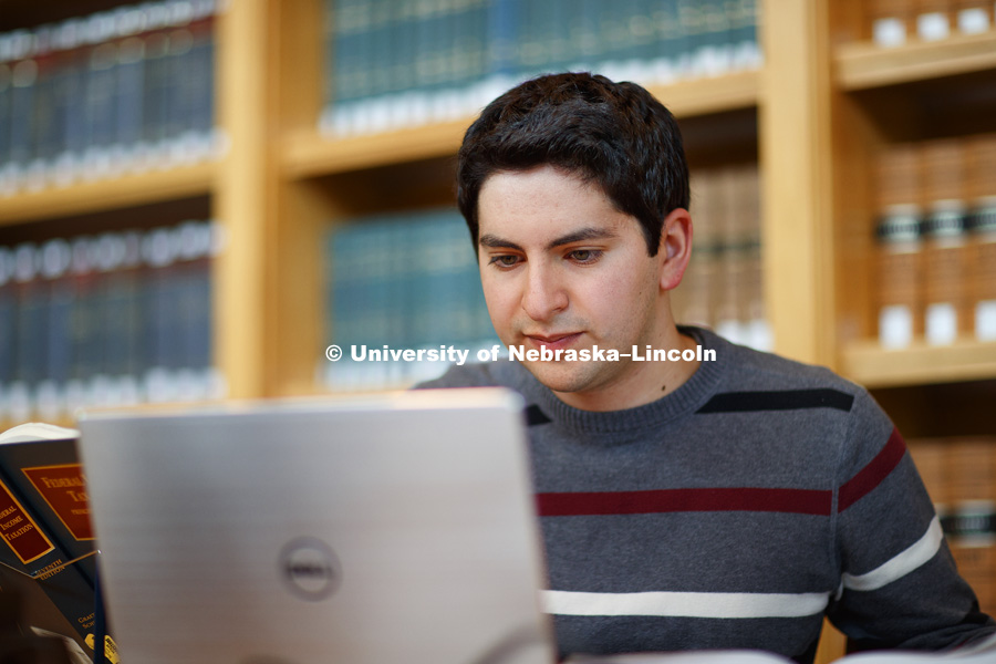 Daniel Segura studies in the law library. College of Law photo shoot. September 14, 2017. Photo by Craig Chandler / University Communication.