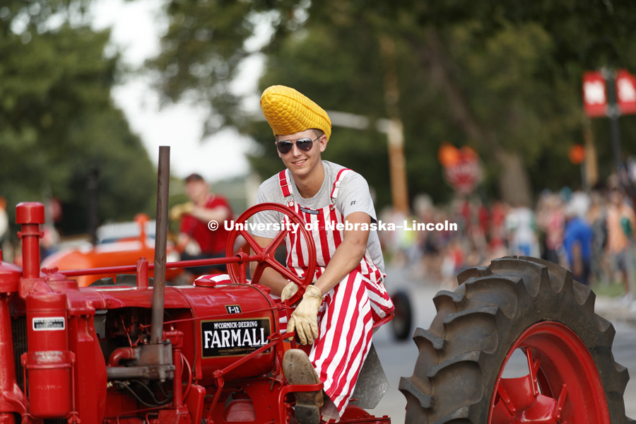 The tractor restoration club drove many of the tractors from East Campus' Tractor Museum. Homecoming parade, pep rally and court jester competition. September 22, 2017. Photo by Craig Chandler / University Communication.