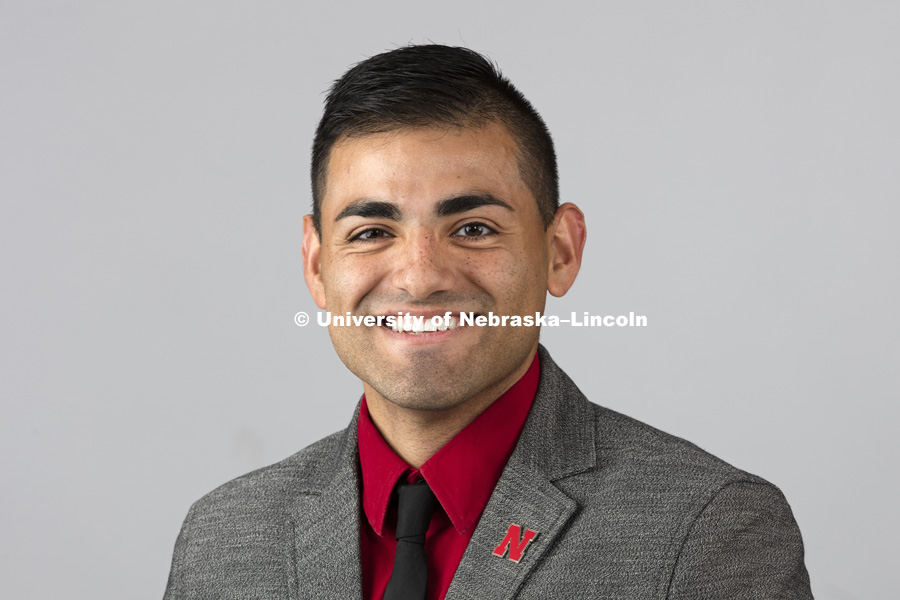 Studio portrait of Felix Cortes, Admissions Counselor for Office of Admissions. October 17, 2017. Photo by Craig Chandler / University Communication.