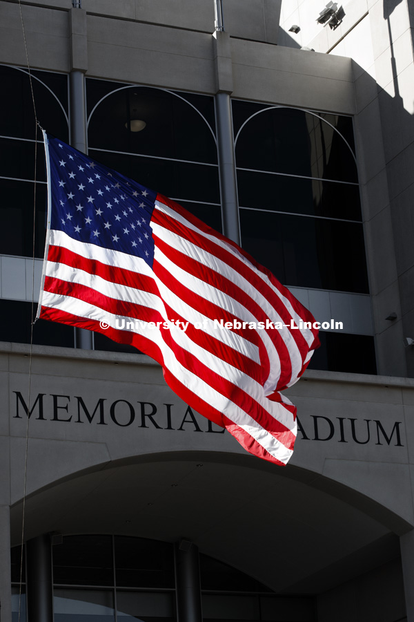 Flag outside Memorial Stadium. November 9, 2017. Photo by Craig Chandler / University Communication.