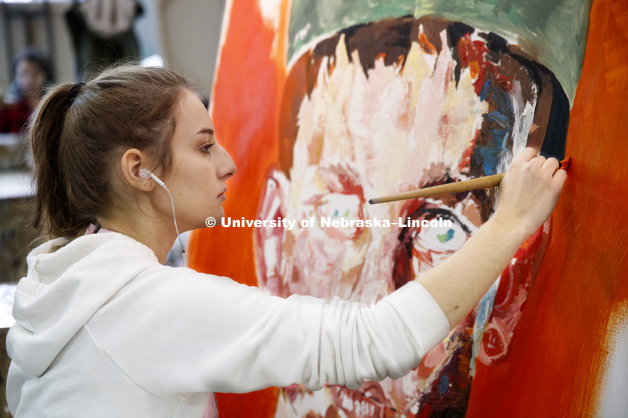 Jessica Reiter, a junior from David City, NE, works on her painting. Aaron Holz beginning painting class works on final projects in Richards Hall. The students learn brush strokes and technique by copying a master work of art. PANT 251 - Beginning