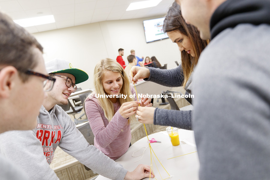 Troy Smith teaches MNGT 360 - Managing Behavior in Organizations in Howard Hawks Hall. The class was learning about leadership styles by building a tower with spaghetti. College of Business. November 29, 2017. Photo by Craig Chandler / University