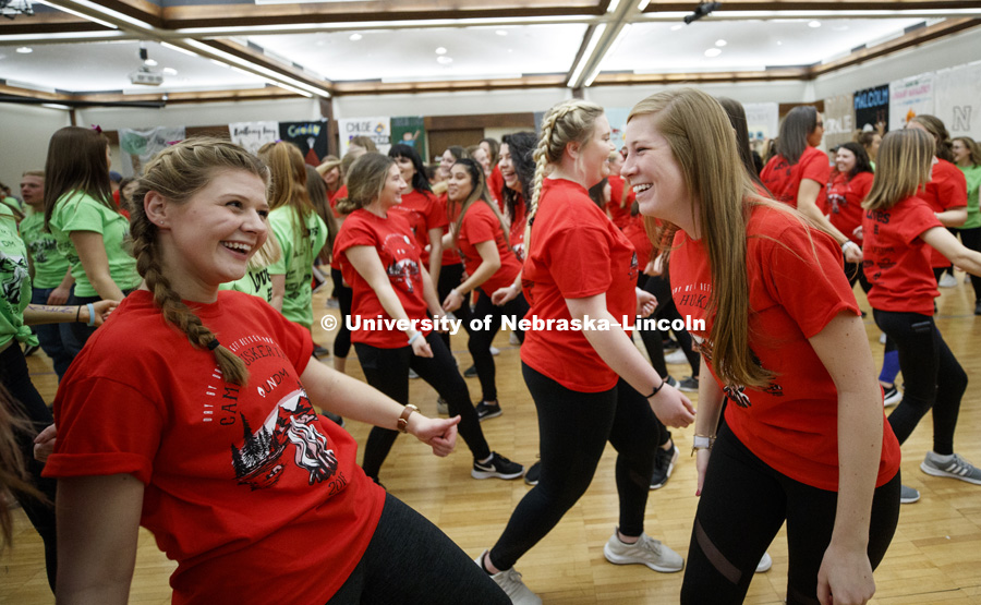 Phi Mu’s Morgan Wirth-Murry and Ashlyn Salts are among 1274 Nebraska students dancing in the Huskerthon Dance Marathon for Omaha's Children's Hospital. The marathon takes over the second floor of the Nebraska Union. February 17, 2019. Photo by Craig