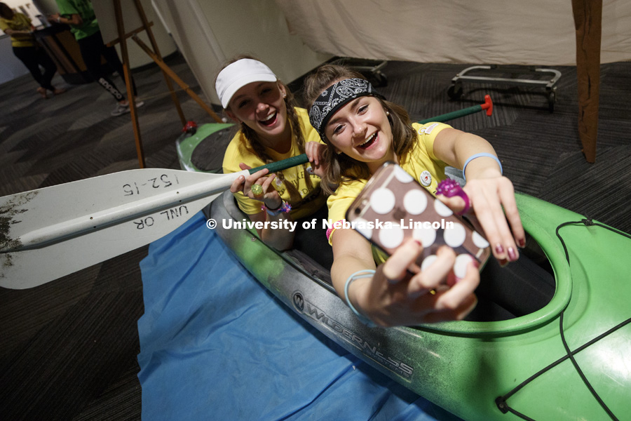 Lauren Holm and Rachel Speckmann take a selfie in a kayak outside the Union Ballroom as part of the Huskerthon's camp theme. 1274 Nebraska students signed up to be part of the Huskerthon Dance Marathon for Children's Hospital in Omaha. February 17, 2019.