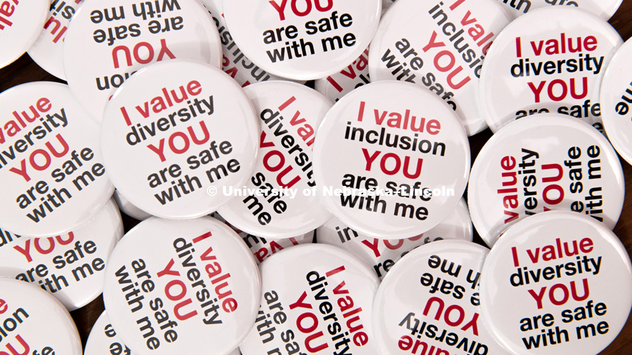 A frank discussion about campus climate and hate speech inspired a University of Nebraska-Lincoln employee to design wearable buttons that herald diversity and inclusion. The button design by Cindy Miesbach is available for staff employees to show their