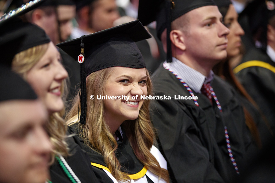 Andrea Wach smiles for the camera at the Undergraduate Commencement at Pinnacle Bank Arena. May 5, 2018. Photo by Craig Chandler / University Communication.