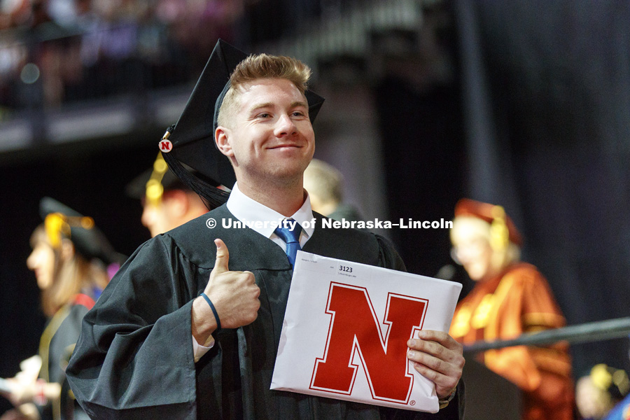 Ty Mangers celebrates his Arts and Sciences degree. Undergraduate Commencement at Pinnacle Bank Arena. May 5, 2018. Photo by Craig Chandler / University Communication.