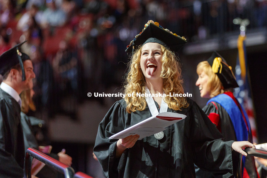 Jayme Matis celebrates her College of Business degree. Undergraduate Commencement at Pinnacle Bank Arena. May 5, 2018. Photo by Craig Chandler / University Communication.