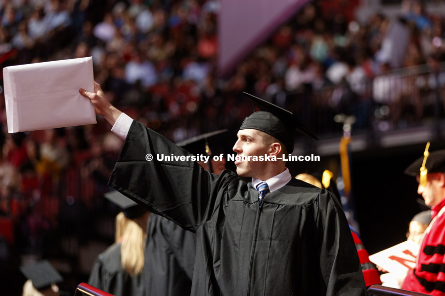 Nicholas Theisen celebrates his College of Business degree. Undergraduate Commencement at Pinnacle Bank Arena. May 5, 2018. Photo by Craig Chandler / University Communication.