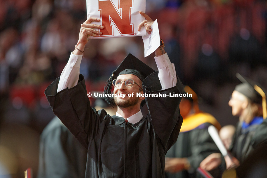 Cameron Holmes celebrates his Arts and Sciences degree. Undergraduate Commencement at Pinnacle Bank Arena. May 5, 2018. Photo by Craig Chandler / University Communication.