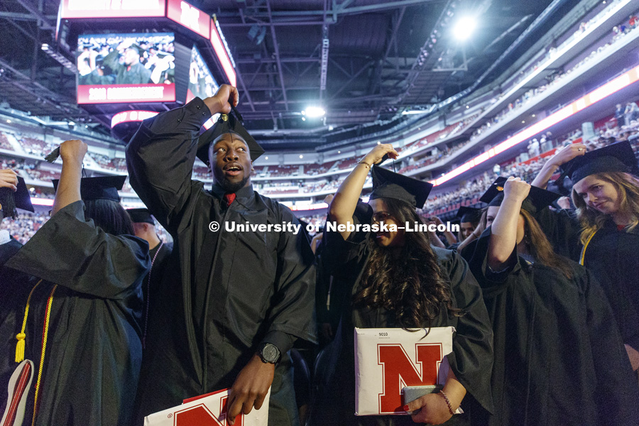 Arts and Sciences graduates Freedom Akinmoladun and Nasam Altwal are part of the 3,221 new Nebraska graduates to move their tassels from right to left. Undergraduate Commencement at Pinnacle Bank Arena. May 5, 2018. Photo by Craig Chandler / University