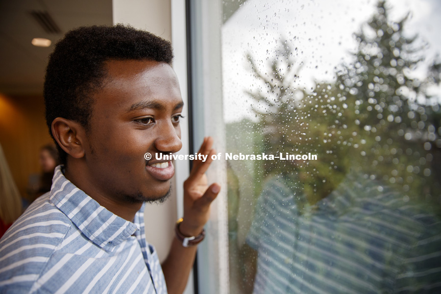 One young man looking out a window. CASNR photo shoot on East Campus. May 29, 2018. Photo by Craig Chandler / University Communication.