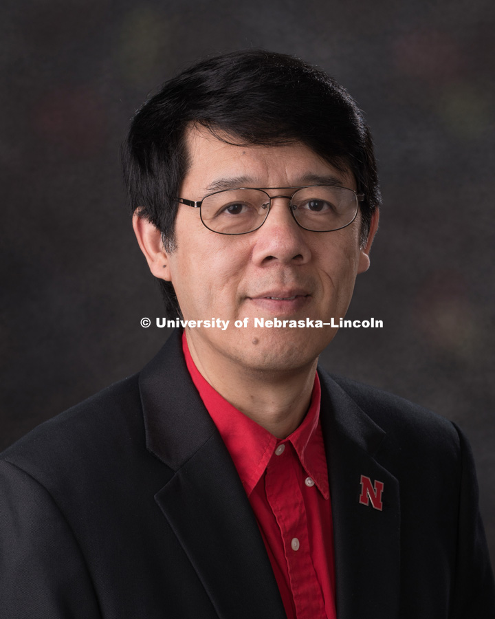 Studio portrait of Xiao Cheng Zeng, Professor, Chemistry. August 9, 2018. Photo by Greg Nathan, University Communication Photographer.