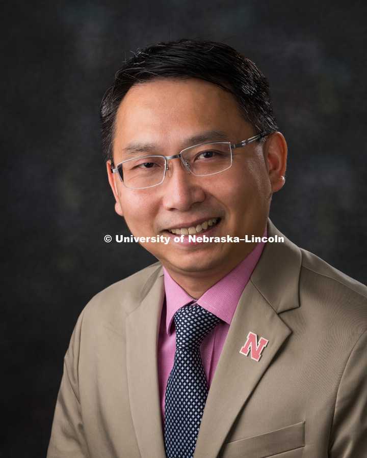 Studio portrait of Barry Cheung, Associate Professor, Chemistry. August 9, 2018. Photo by Greg Nathan, University Communication Photographer.