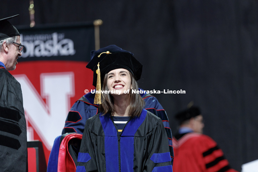 Jessica DeSilva celebrates as she receives her Doctor of Philosophy in mathematics Saturday morning. Summer Commencement at Pinnacle Bank Arena. August 11, 2018. Photo by Craig Chandler / University Communication.