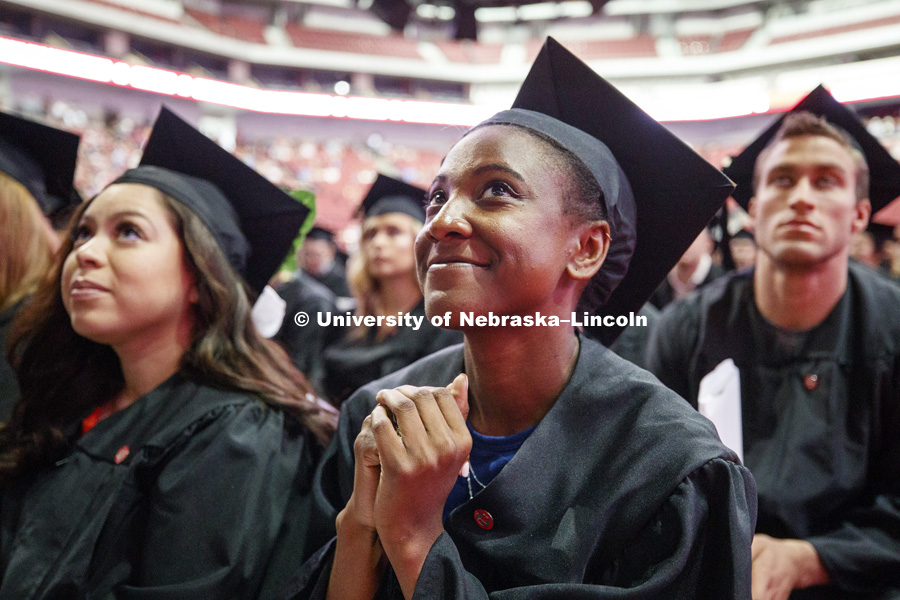 Kristen Dowell watches the Nebraska Alumni Association video after she and the other graduates walked. Summer Commencement at Pinnacle Bank Arena. August 11, 2018. Photo by Craig Chandler / University Communication.